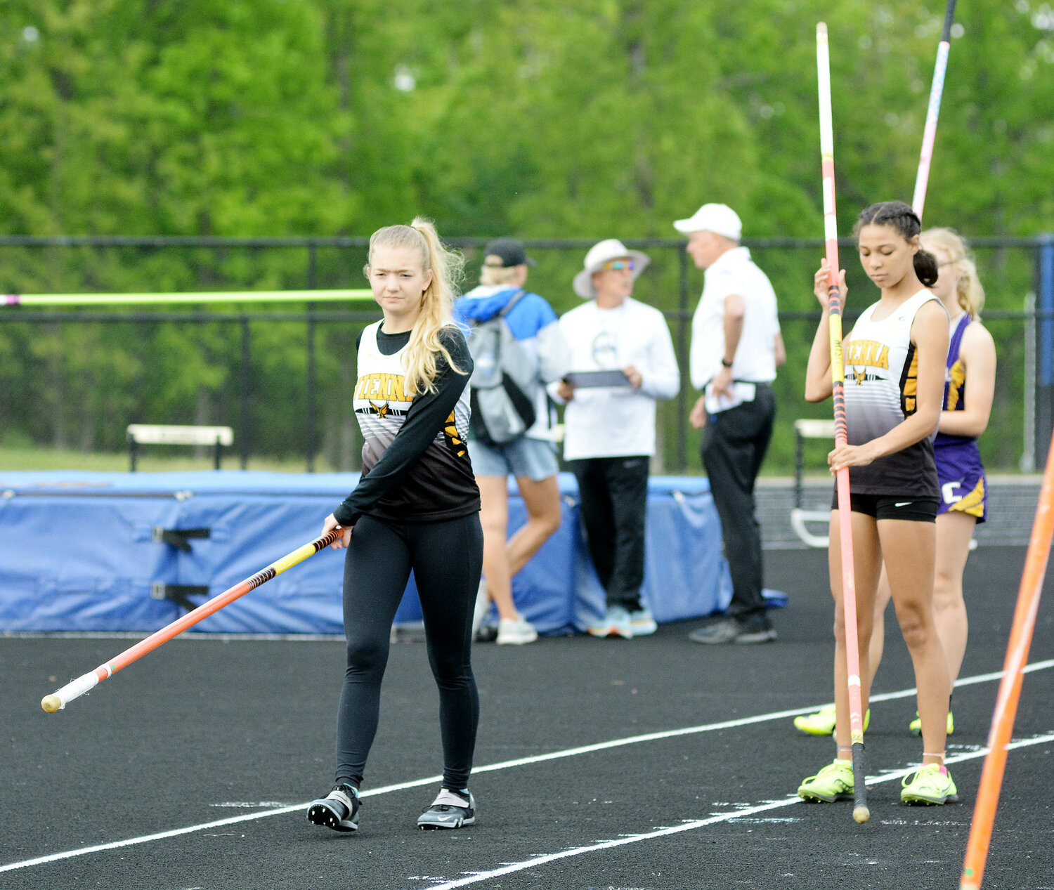 Riley Rosentreter and Julianna Davis (from left) prepare to compete in the girls pole vault during the MSHSAA Class 1, District 2 meet held at South Callaway High School in Mokane.